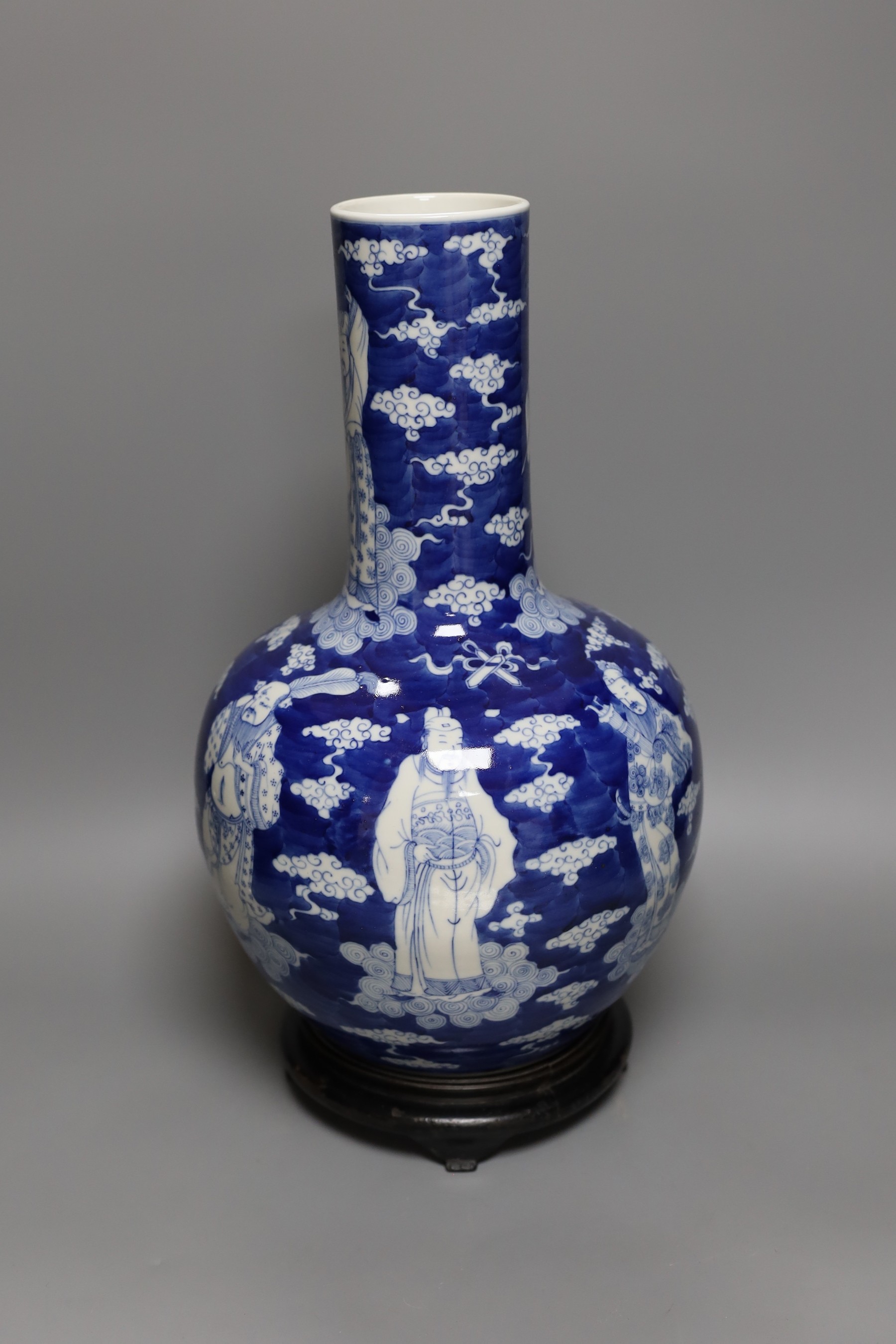 A Chinese baluster vase in underglaze blue, on stand, total height 40cm